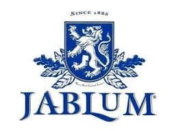Jablum logo with a blue emblem and text on a white background. Top-quality single estate coffee beans displayed with holiday lights, elegantly packed for birthdays or Christmas – a best-selling coffee gift idea for coffee lovers.